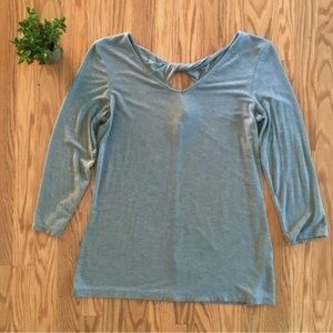 Akini baby blue twist back quarter length tee. Free beauty gift with purchase.